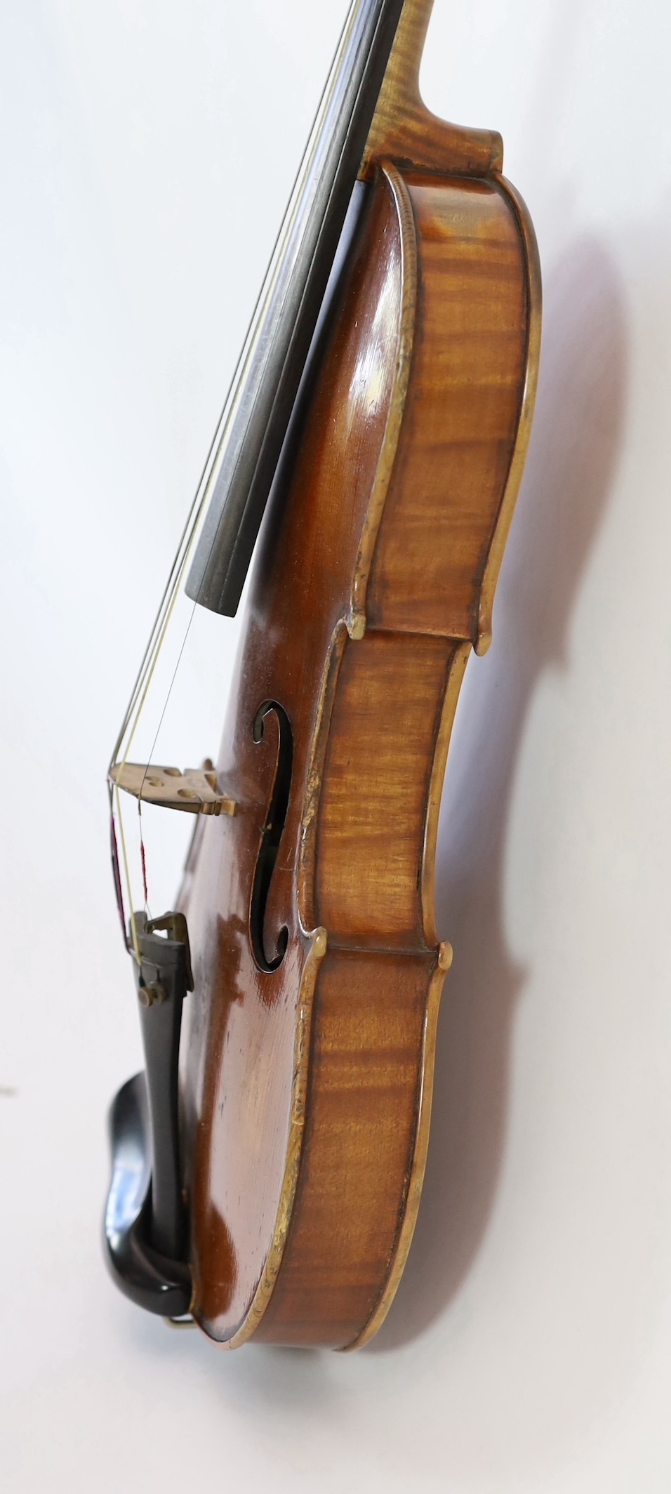 A violin, labelled Leandro Bisiach della Scuola Cremonese fece in Milano 1898, Piazzo del Duomo, length of back 35.6 cm (14in.) cased